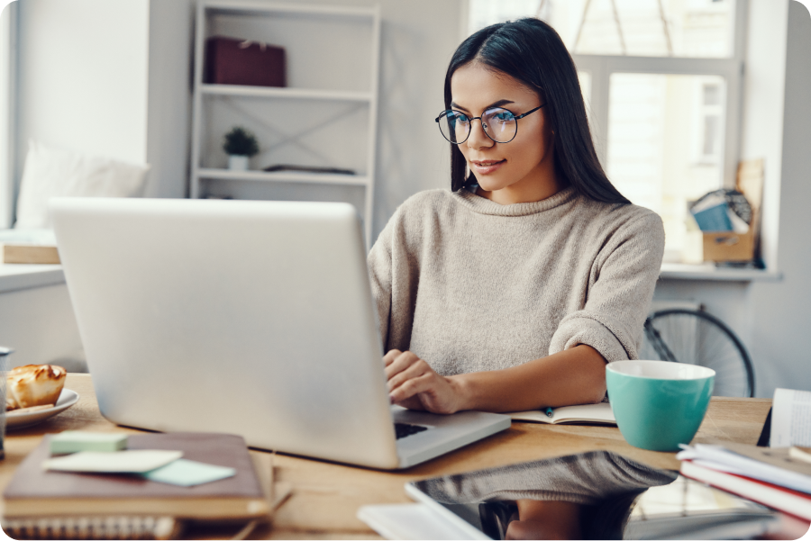 woman on computer using her legal practice management platform