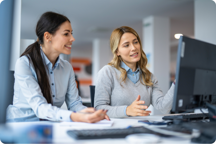 two attorneys discussing documents within their legal practice management platform