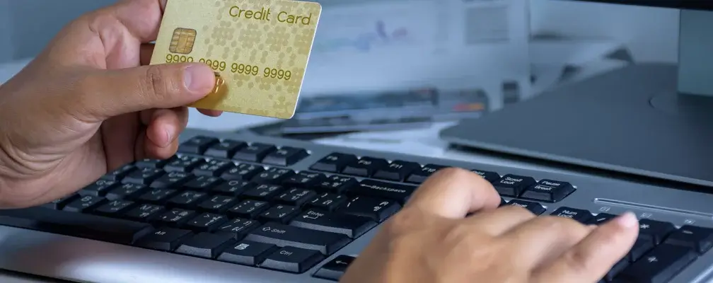 person filling out their credit card information online