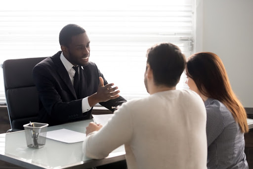 lawyer meeting with clients