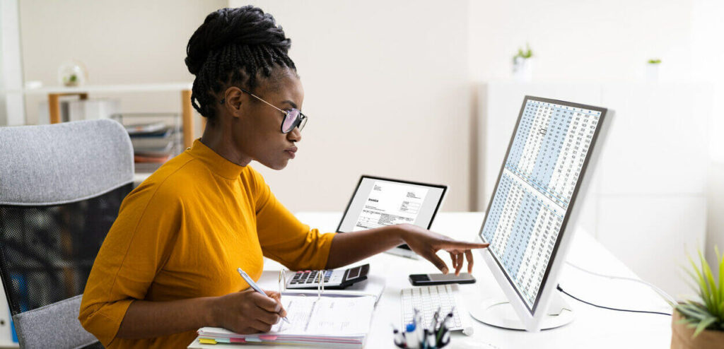 woman working on her computer at home