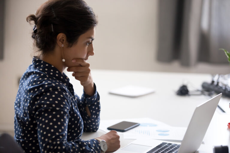 blog header image of woman looking at data