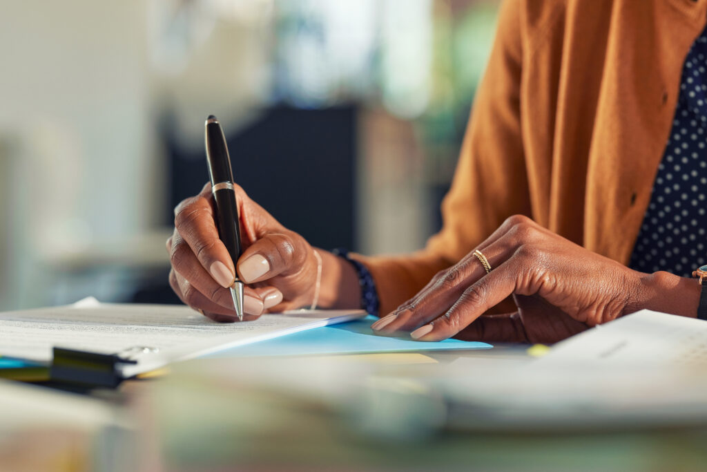 blog header image of insurance documents being signed