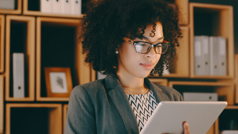 header image of lawyer looking at tablet in office