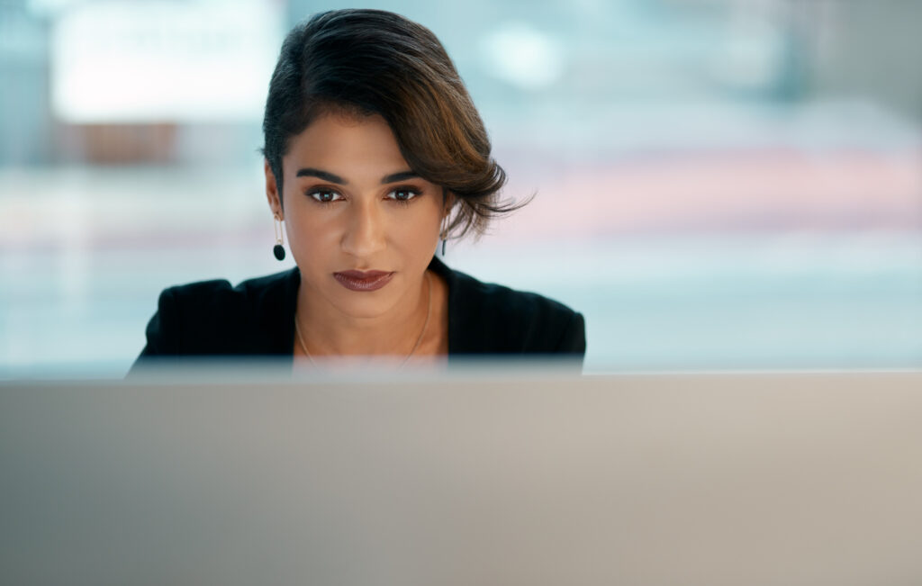 header image of lawyer sitting behind computer