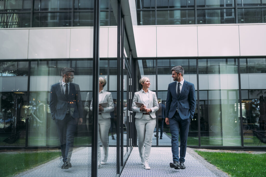 Attorneys walking outside of law firm office