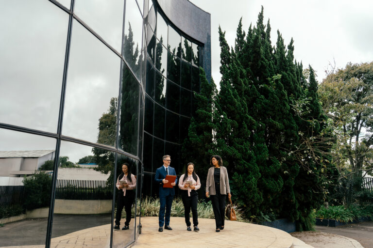 Professionals walking around a building
