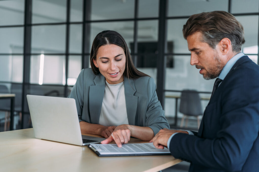 Two lawyers discussing fees