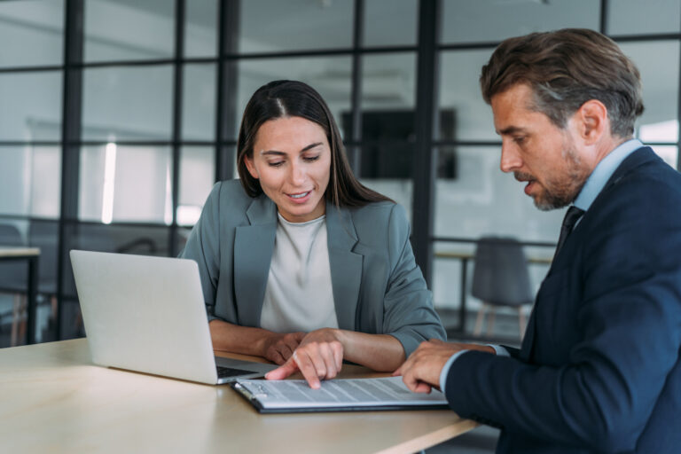 Two lawyers discussing fees