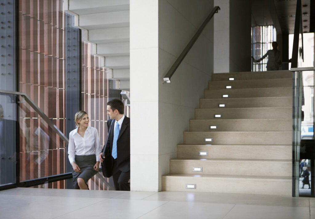 Professionals walking up stairs