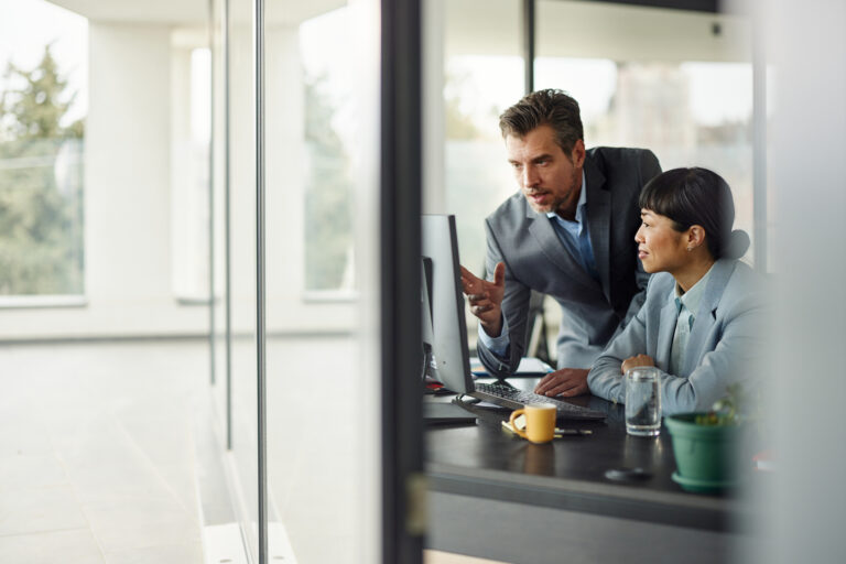 Two legal litigation professionals working together